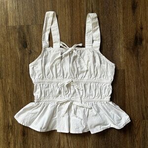 White Sleeveless Peplum Top